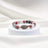 Mala Armband Rhodonit/grauer Quarz mit Feder